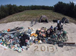 13,795-kg pile of derelict fishing gear and plastic debris.